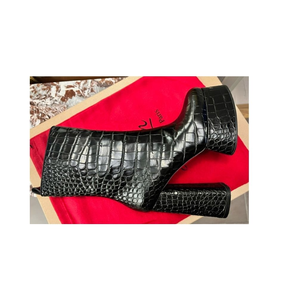 Christian Louboutin saappaat